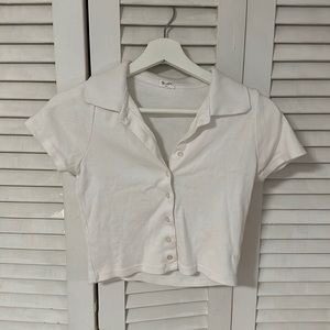 John Galt. Size: Small. Color: white.